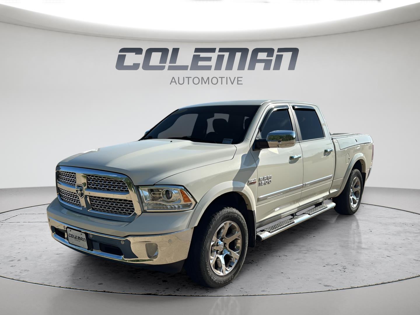 2017 RAM 1500 Laramie Crew Cab 4x4 6'4' Box in Pearl White — front three-quarter view