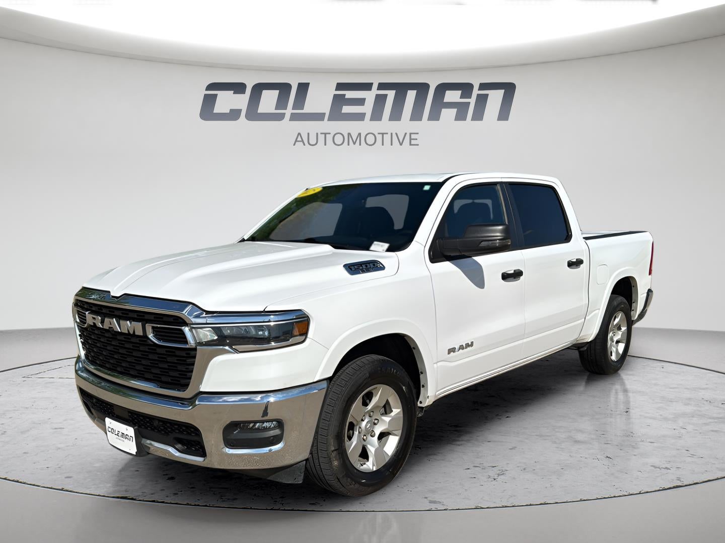 2025 RAM 1500 Big Horn Crew Cab 4x4 5'7' Box in Bright White Clearcoat — front three-quarter view