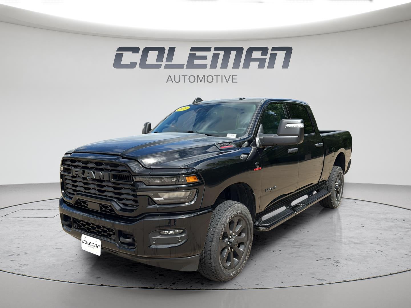2025 RAM 2500 Big Horn Crew Cab 4x4 6'4' Box in Black — front three-quarter view