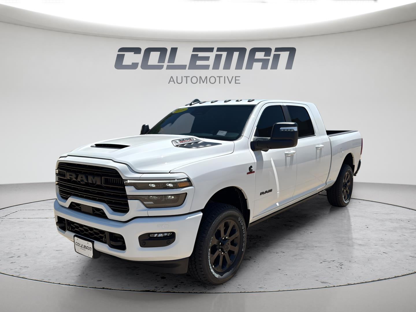 2026 RAM Ram 2500 RAM 2500 LARAMIE MEGA CAB 4X4 6'4' BOX in Bright White Clear-Coat Exterior Paint — front three-quarter view