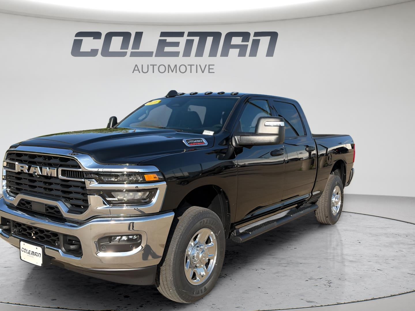 2026 RAM Ram 2500 RAM 2500 TRADESMAN CREW CAB 4X4 6'4' BOX in Diamond Black Crystal Pearl-Coat Exterior Paint — front three-quarter view